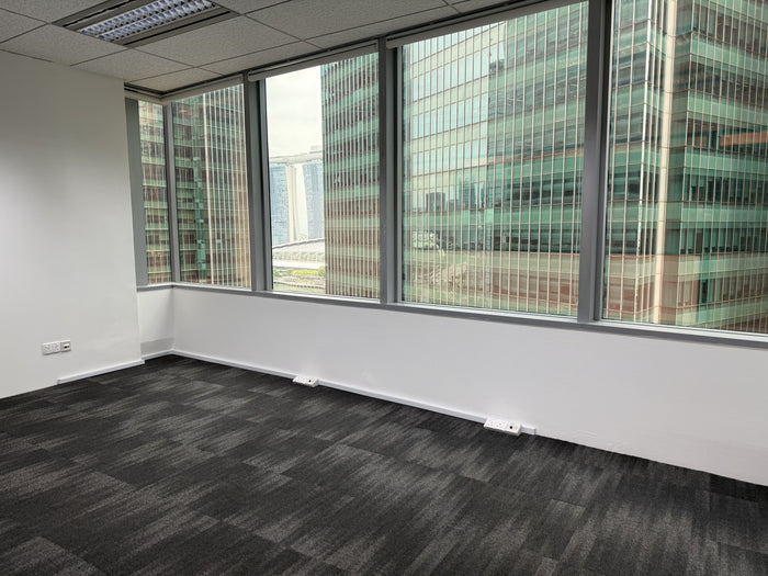 This is a picture of a unit in our space with no furniture. We also accommodate those who prefer to bring their own tables.