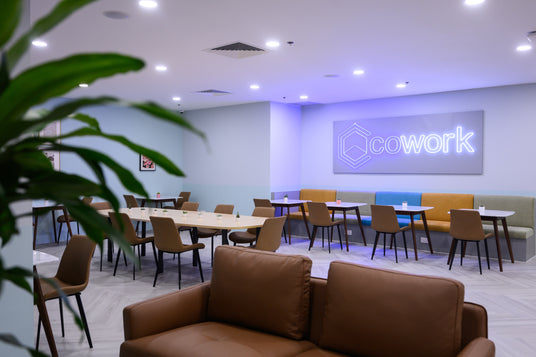 Our shared space includes a sofa and a repurposed meeting table for informal gatherings. People have described our common area as very cosy. 
