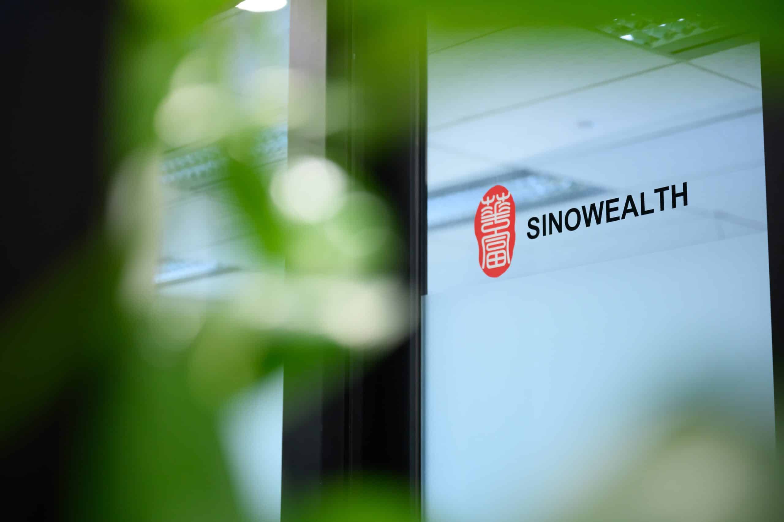 CoWorkSpace office entrance with Sinowealth logo visible.