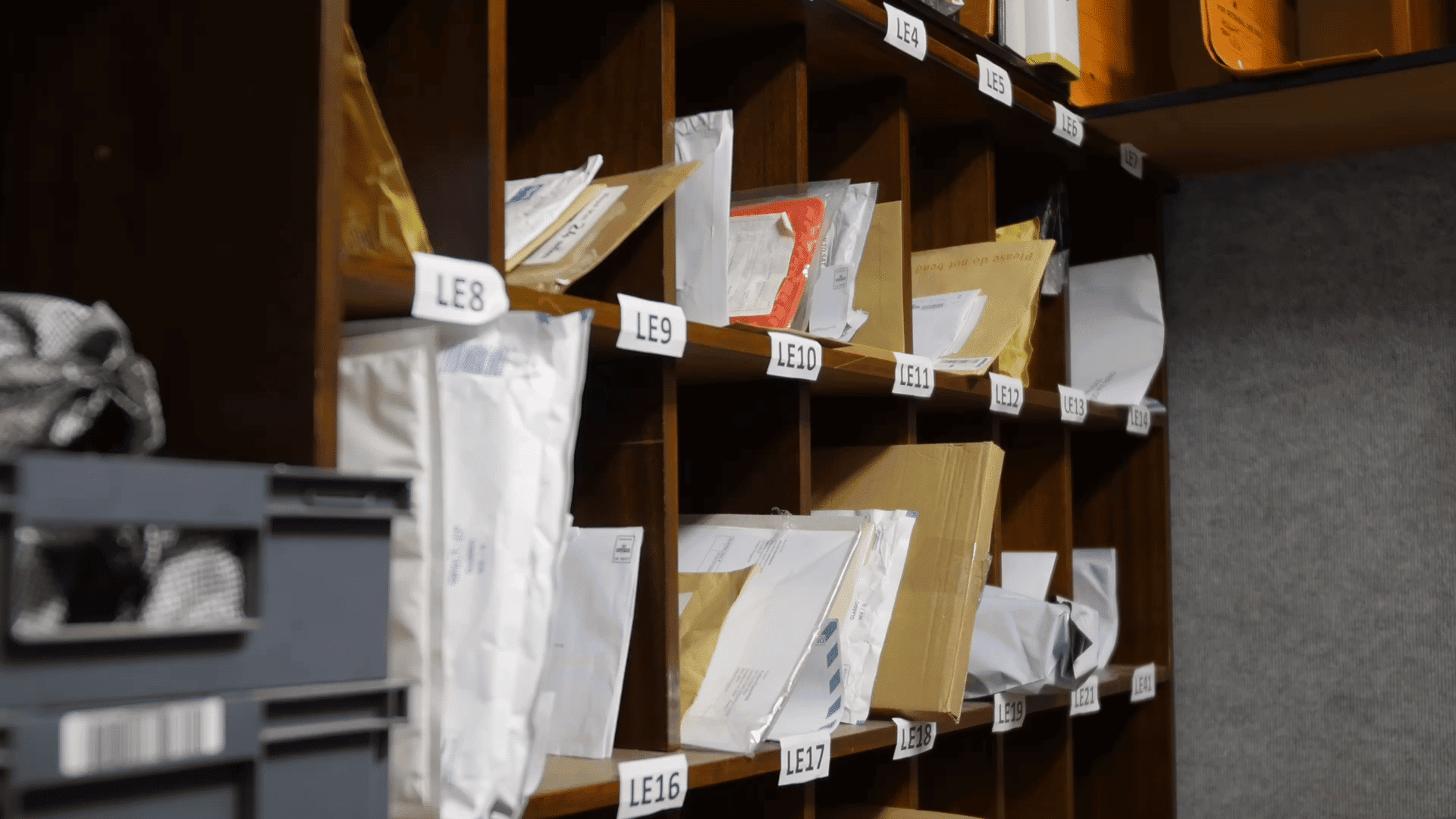 Mailroom with packages and mail slots at CoWorkSpace.