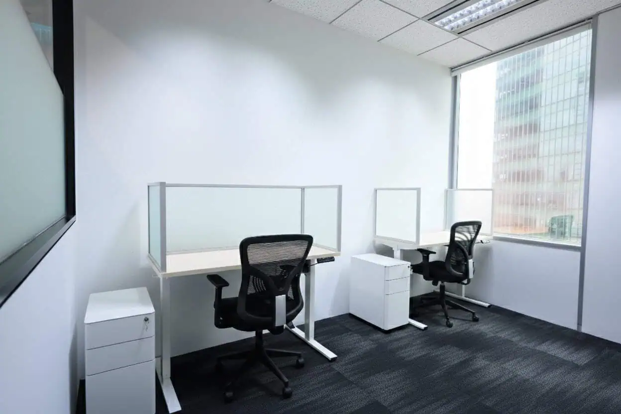 CoWorking Office Space in Singapore Modern co-working office with desks and chairs in Singapore.