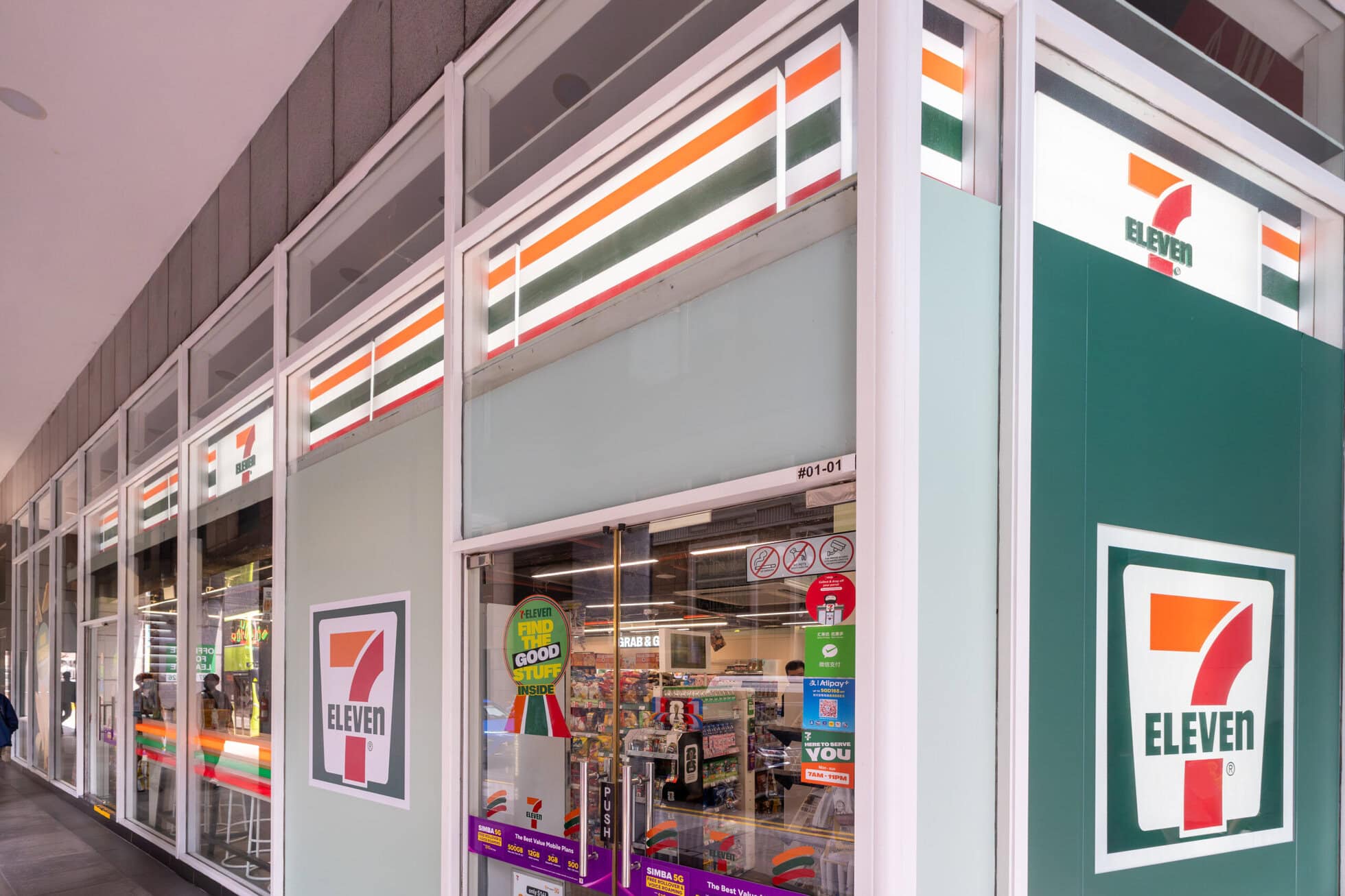7-Eleven store at 4 Robinson Road with coworking space signage.